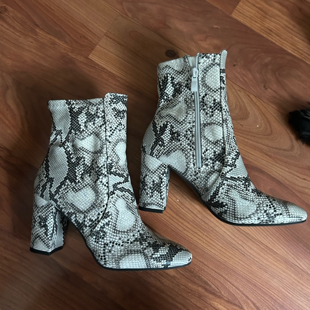 These three boutique snake skin boots